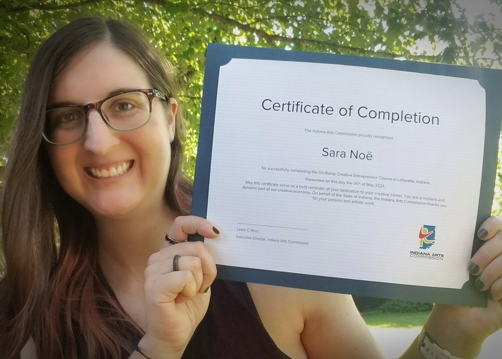 Author Sara A. Noe with On Ramp Creative Entrepreneur Accelerator certificate