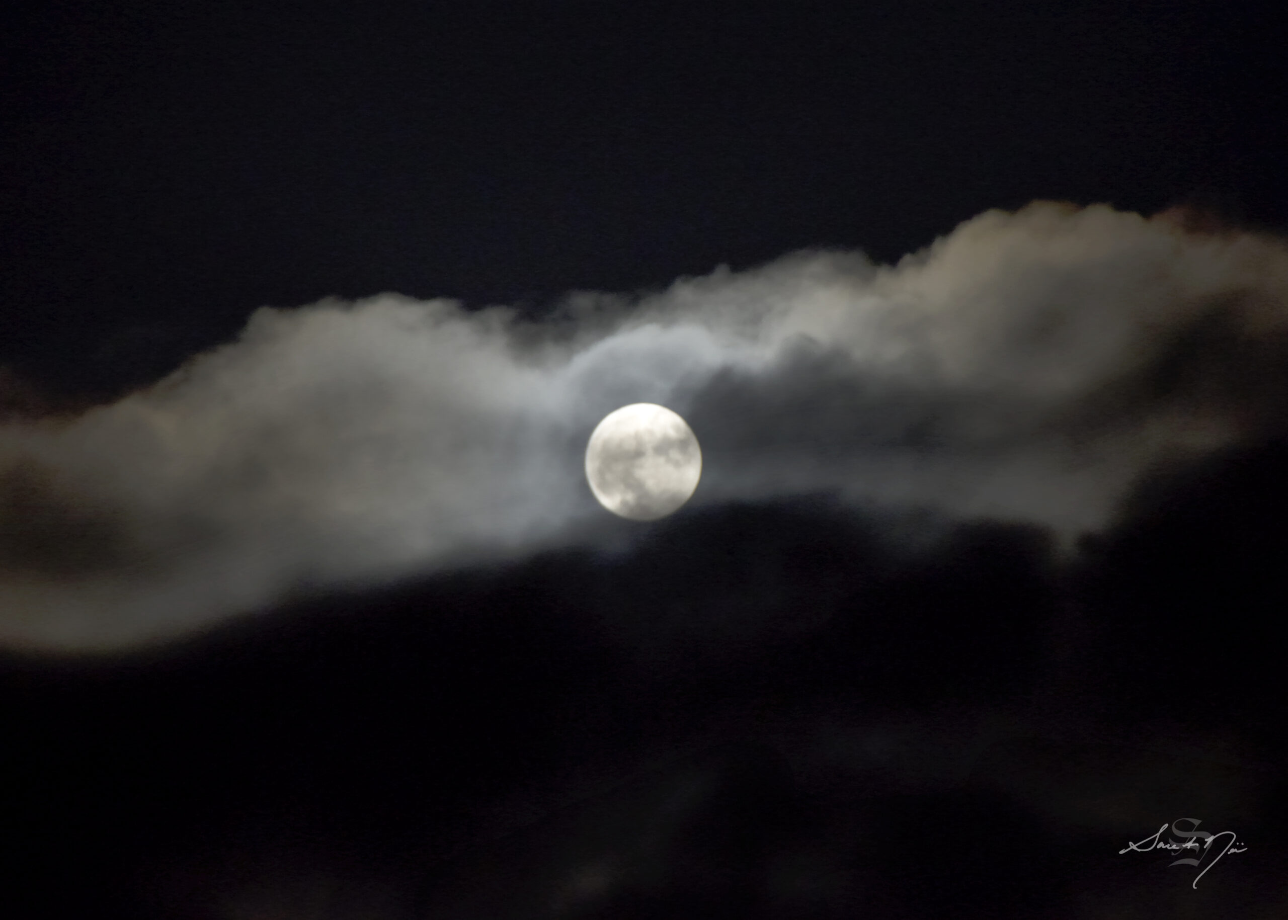 Full moon with cloud bank