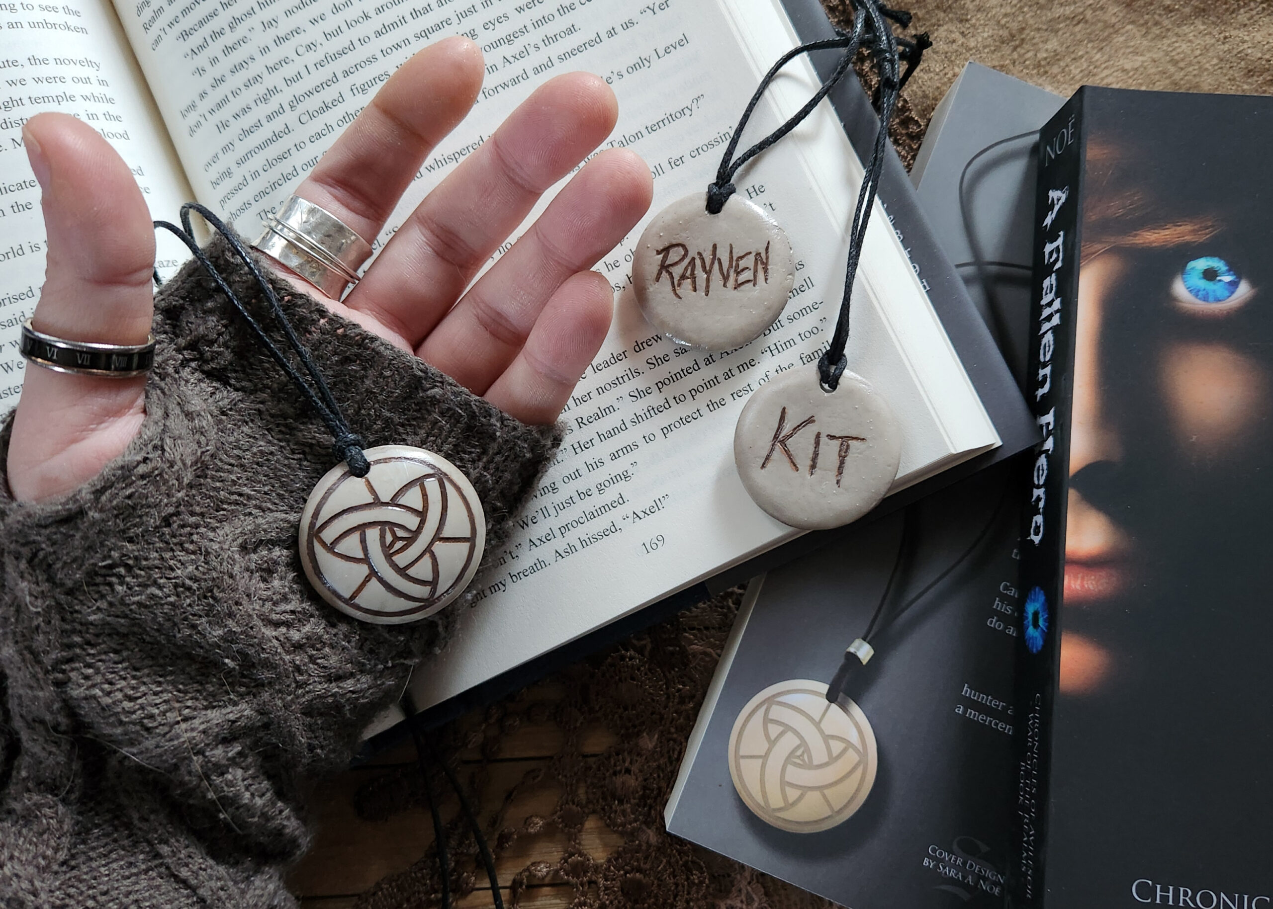 Kit and Rayven Aminyte pendants from the Chronicles of Avilesor: War of the Realms fantasy series