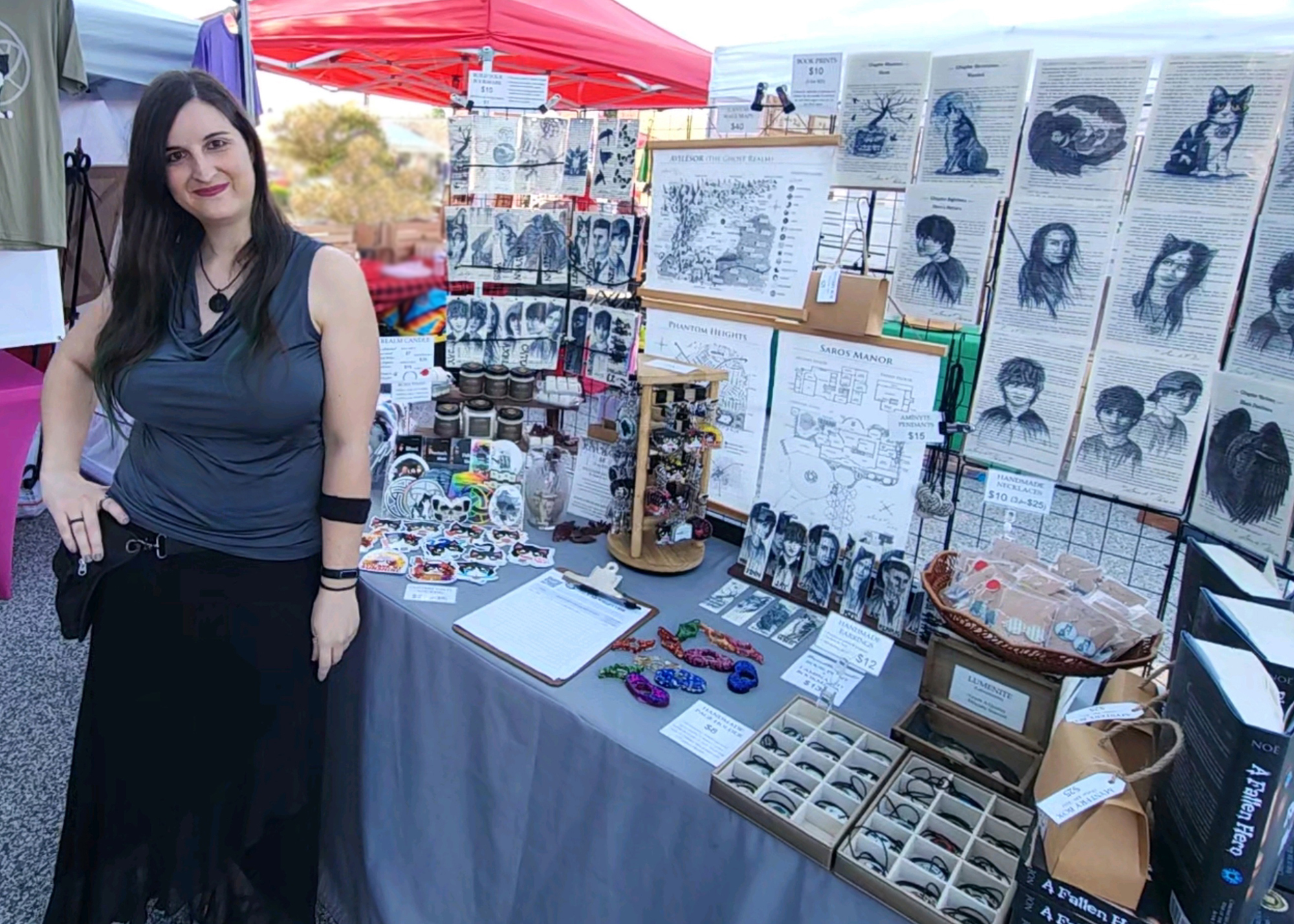 Author and artist Sara A. Noe standing in front of her booth at the Chesterton European Market