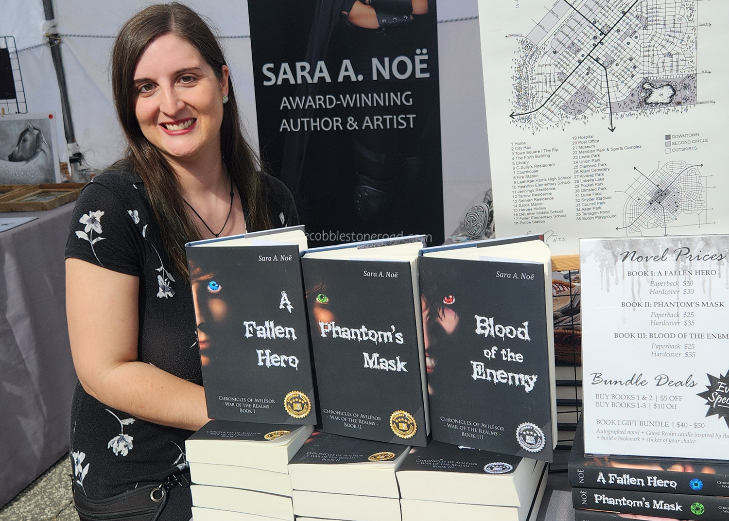 Author Sara A. Noe with the Chronicles of Avilesor books