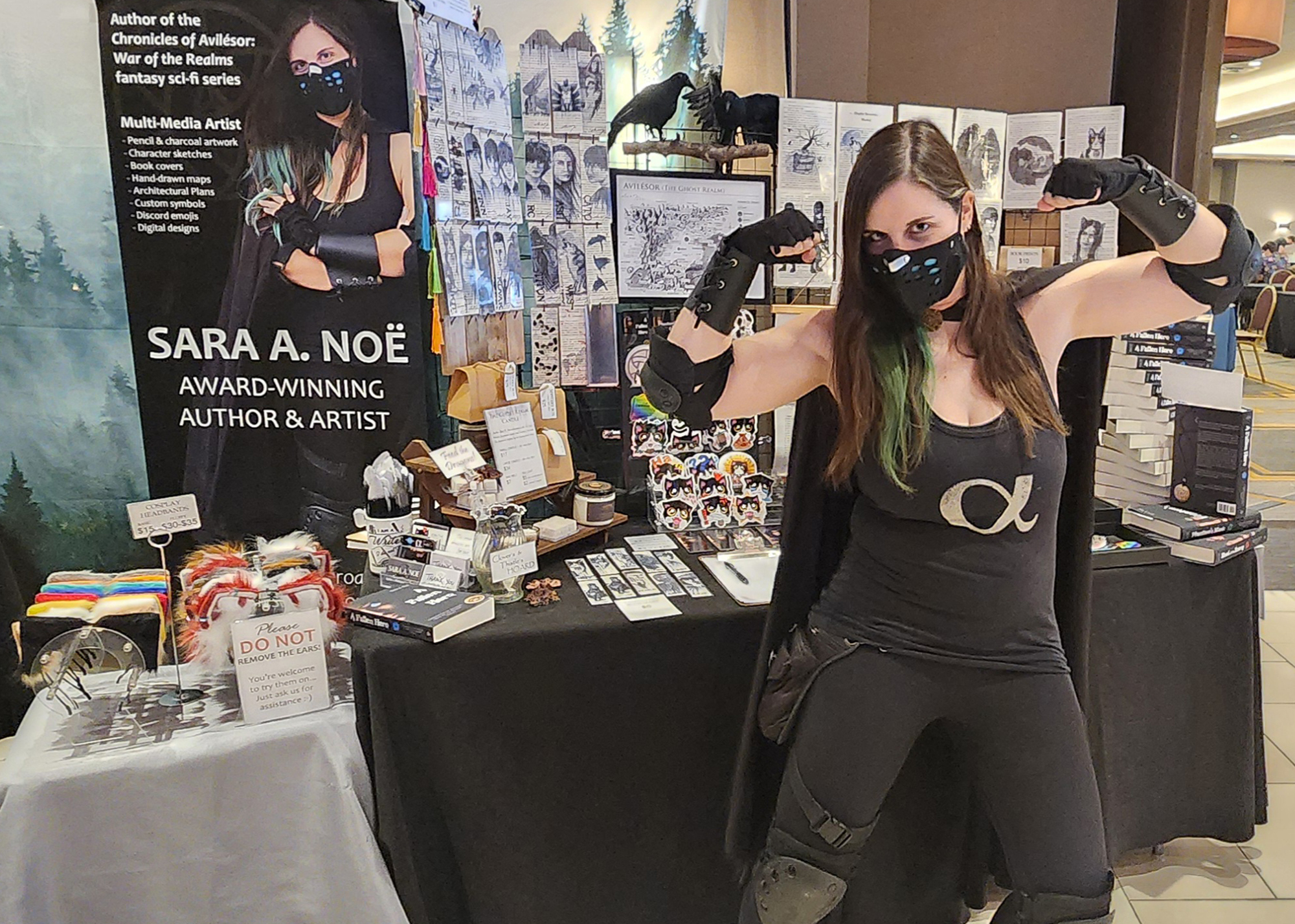 Author Sara A. Noe cosplaying as Cato from the Chronicles of Avilesor in front of her booth